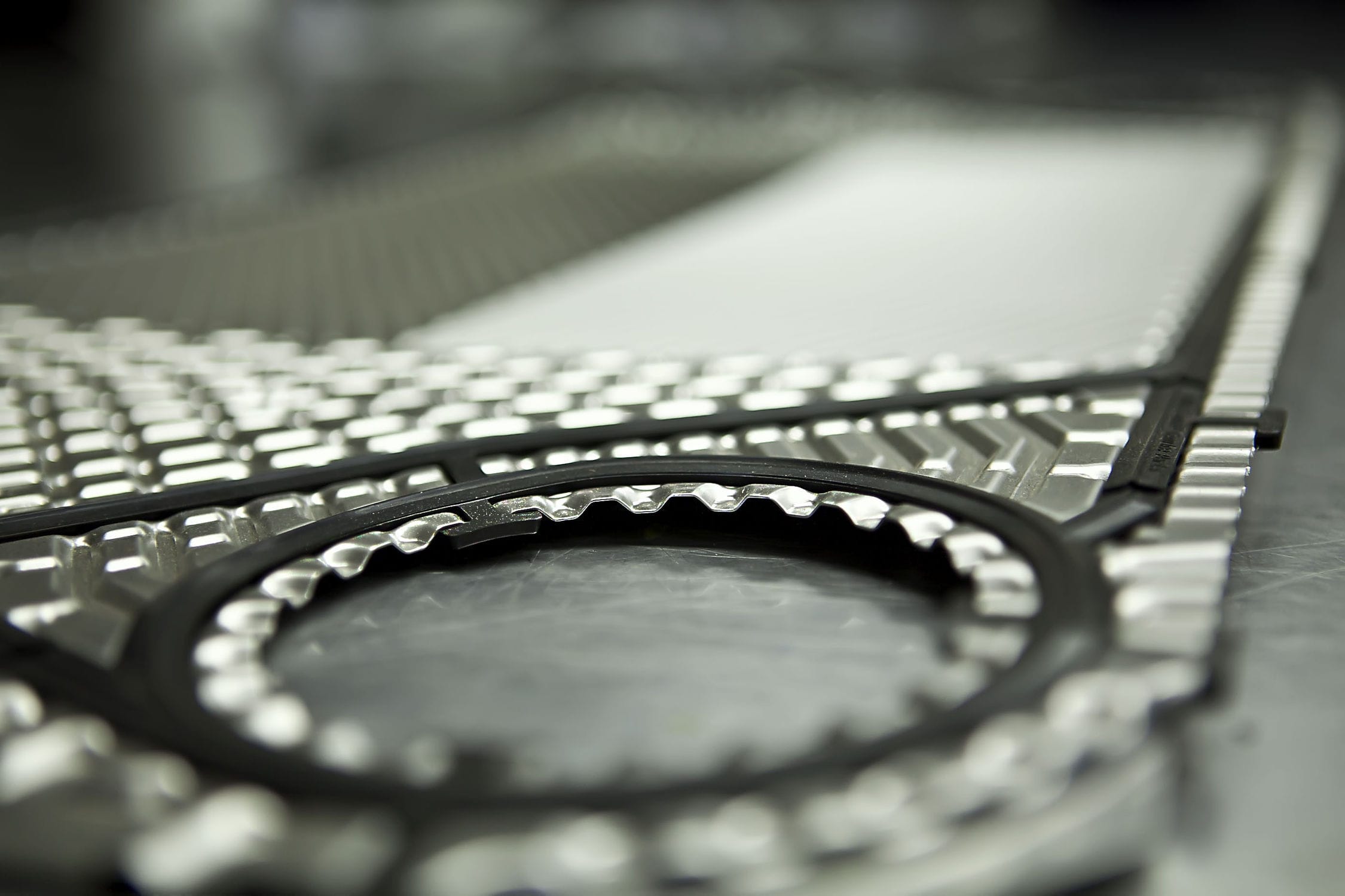 Alfa Laval-compatible clip-on gasket installed on plate heat exchanger – food-grade spare part for F&B processing